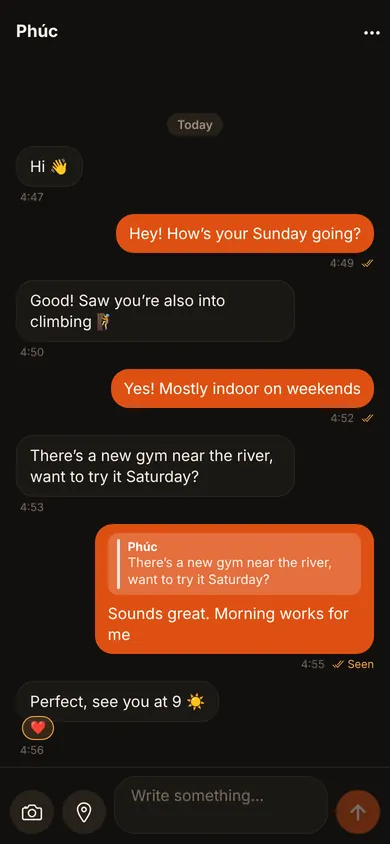 A conversation with a reply and an emoji reaction